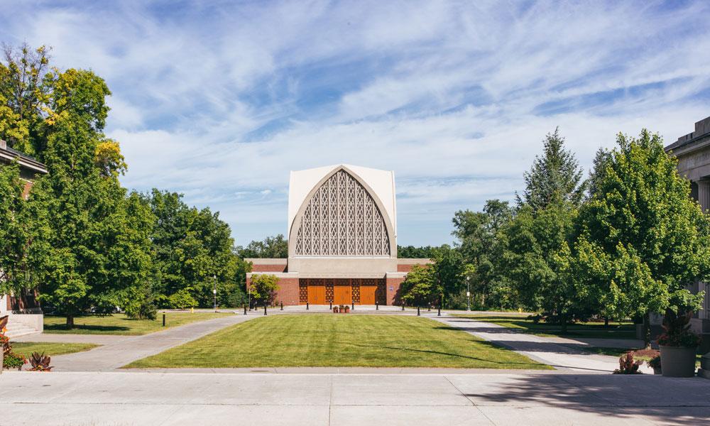 In this photo, exterior view of the Interfaith Chapel as seen from the George Eastman Quad on the University of Rochester's River Campus.